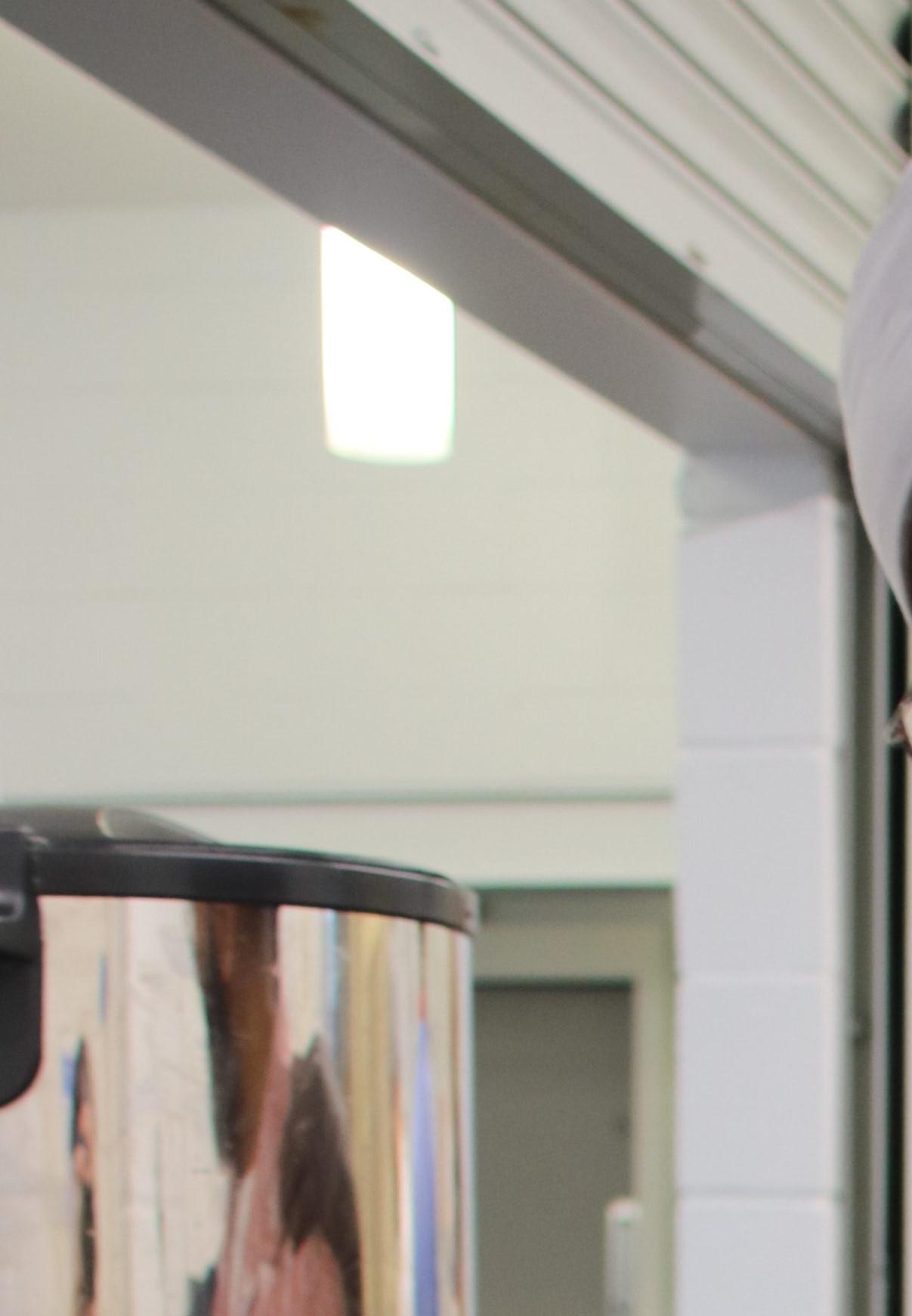 An Asian and a black man cooking.