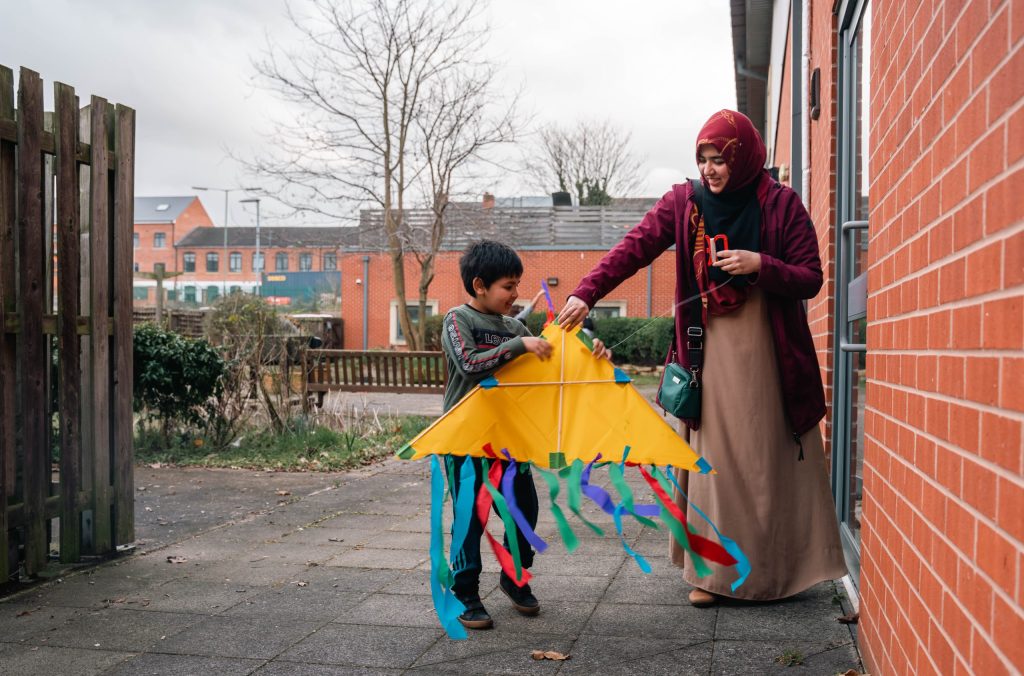 Child at the Festival of Science holding a kite