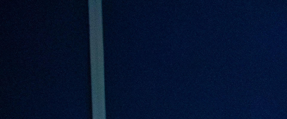 Group of people gathered around a screen map