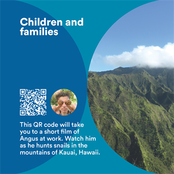 A label with a qr code, man's profile photo with snails over his eyes, a photo of mountains and text that reads: 'This QR code will take you to a short film of Angus at work. Watch him as he hunts snails in the mountains of Kauai, Hawaii.'