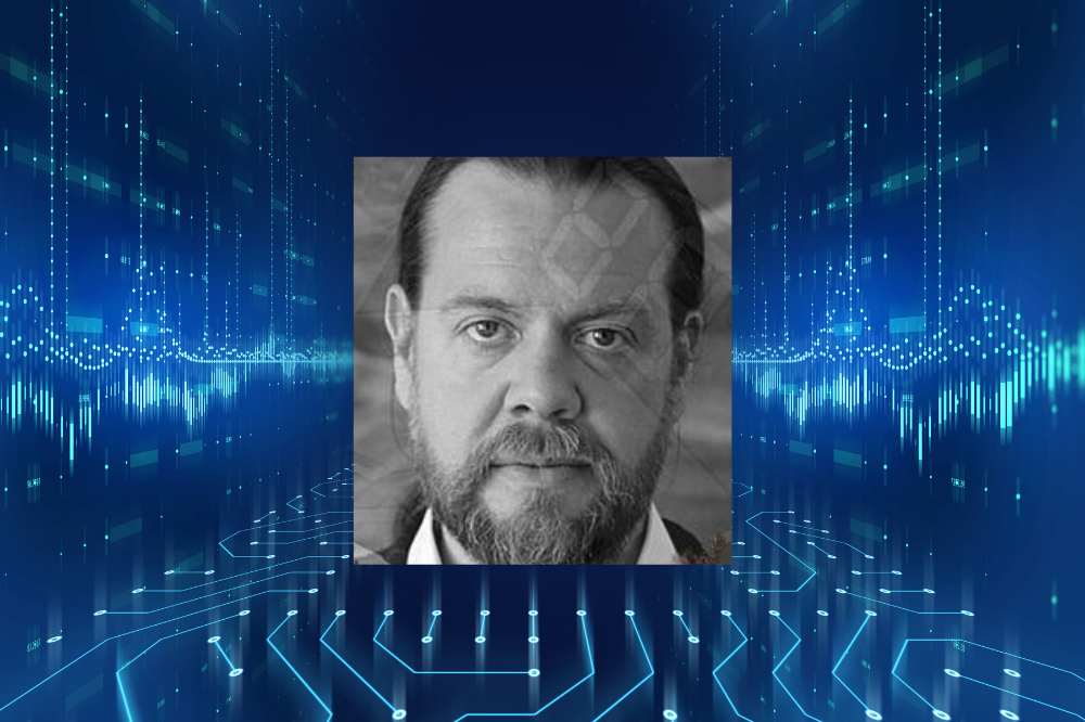 Alan chamberlain man with beard with blue line pattern around him