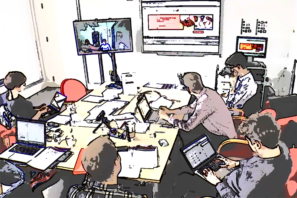 A still from a video of user experience practitioners watching a user on a television