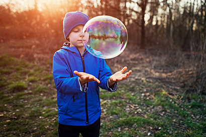 Child with large bubble