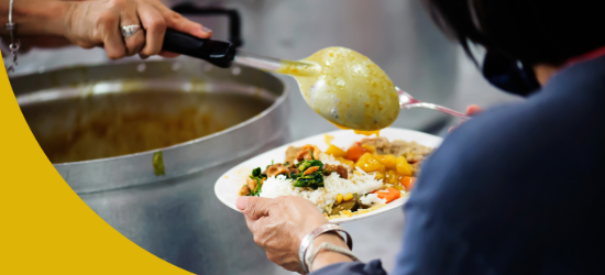 Organic food plate being served at a community food service