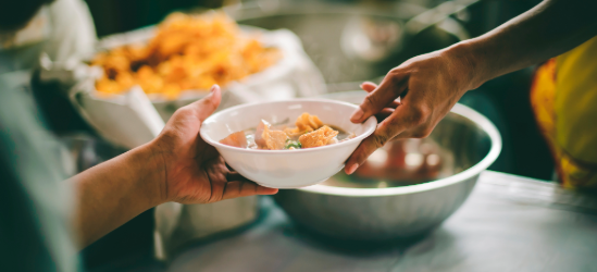 People handing out food at food banks