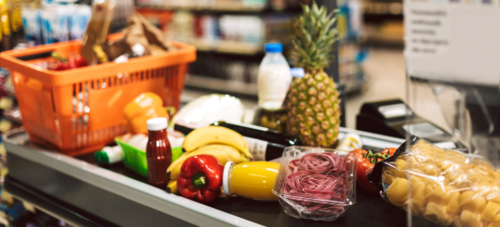 Blue shopping basket with food