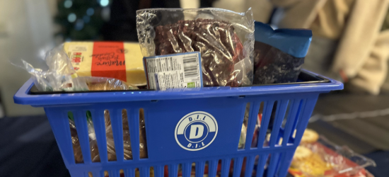 Blue shopping basket with food