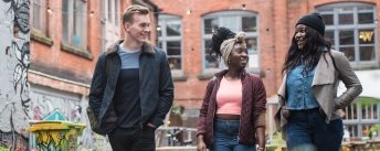 Group of students walking on campus