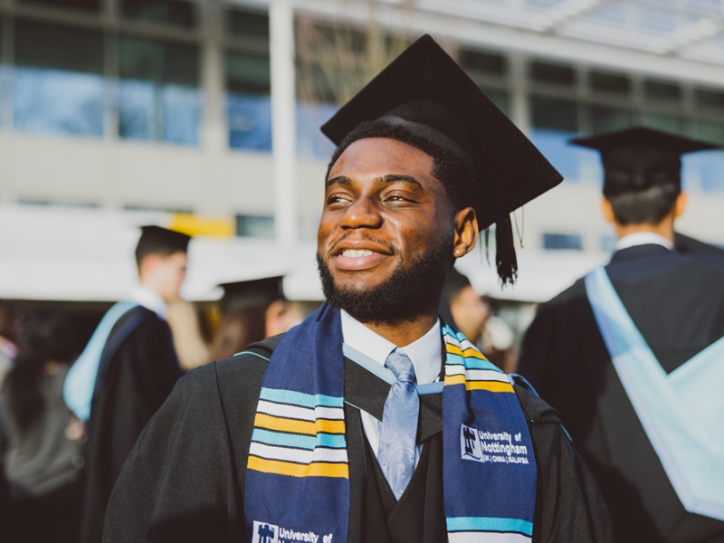 Photograph of a graduate smiling