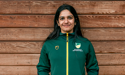 An international sports scholar in our green and gold sports uniform