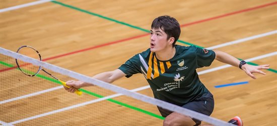 Student playing badminton